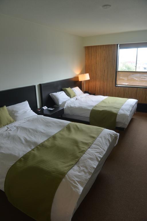 Zimmer mit 2 Queensize-Betten