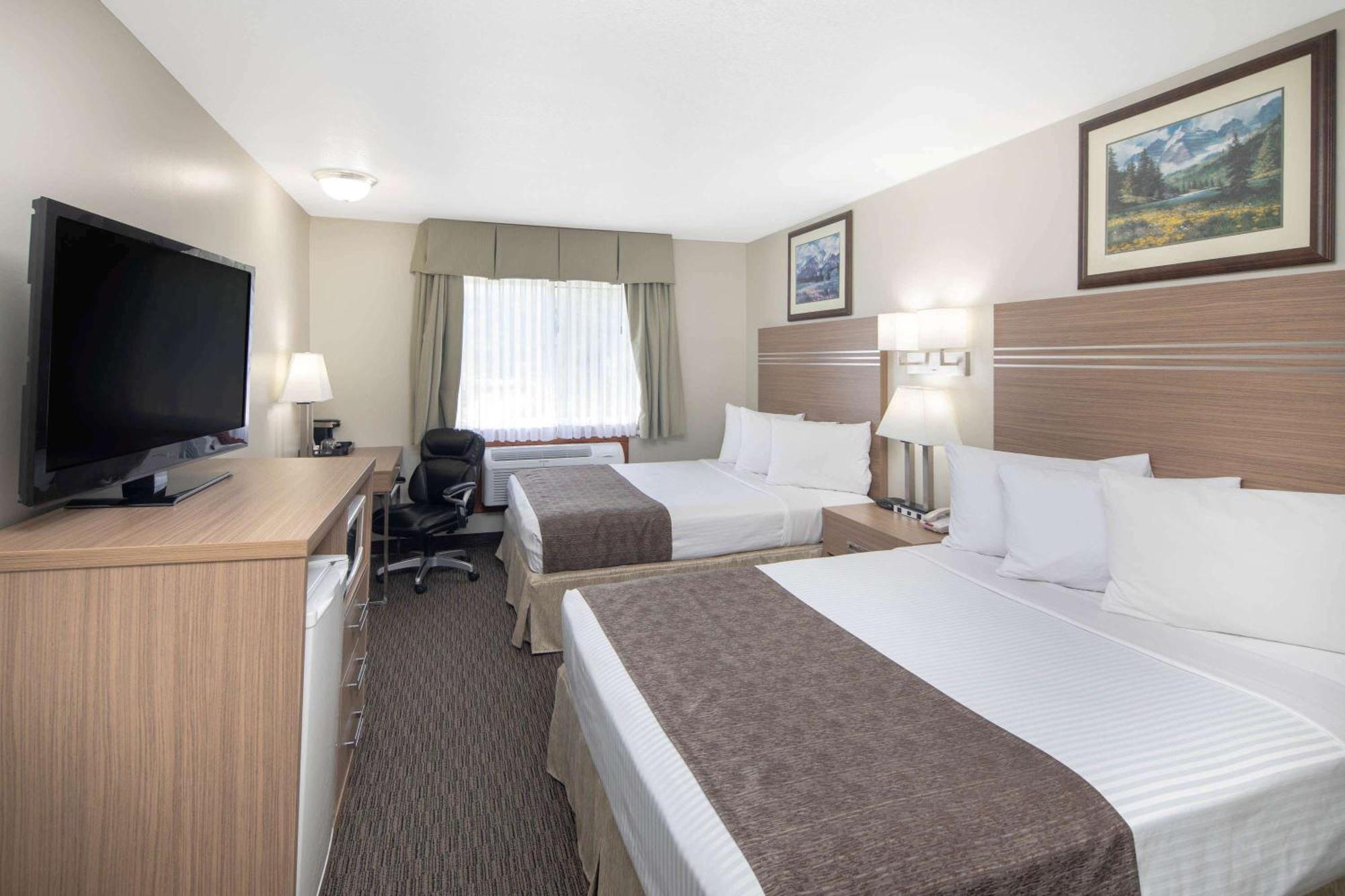 Room with One King Bed and One Queen Bed or One Sofa Bed (Ground Floor) - Non-Smoking
