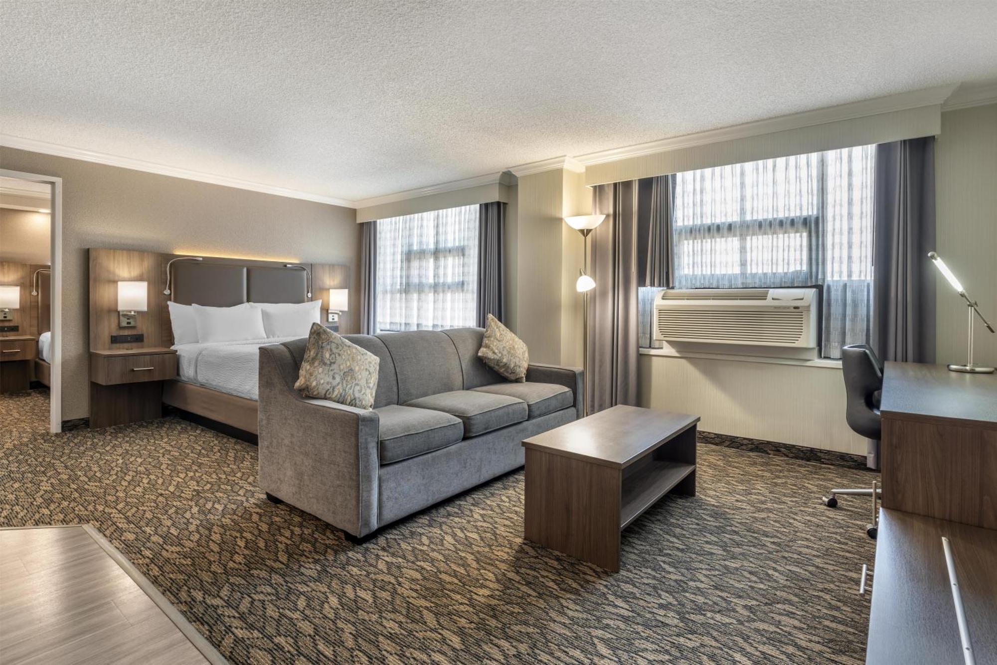 Suite with One King and One Queen Bed,1739378554:JPEG